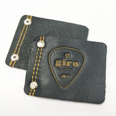Etichette di abbigliamento in pelle personalizzata in rilievo per jeans